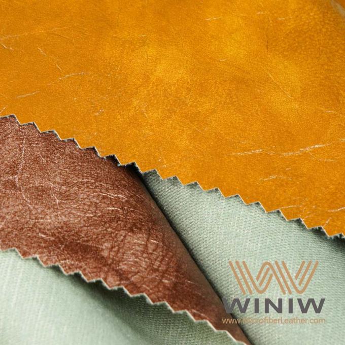 Couro sintético de alta qualidade do estilo clássico de WINIW para vestuários